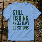 STILL FISHING. KNEES HAVE QUESTIONS. Typography T-Shirt in Blue