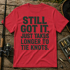 STILL GOT IT. JUST TAKES LONGER TO TIE KNOTS. Typography T-Shirt in Red