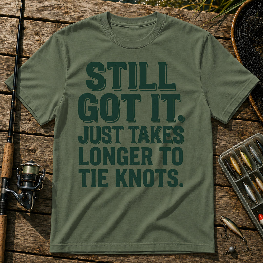 STILL GOT IT. JUST TAKES LONGER TO TIE KNOTS. Typography T-Shirt in Military