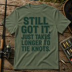 STILL GOT IT. JUST TAKES LONGER TO TIE KNOTS. Typography T-Shirt in Military