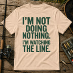 I'M NOT DOING NOTHING. I'M WATCHING THE LINE. Typography T-Shirt in Cream