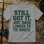STILL GOT IT. JUST TAKES LONGER TO TIE KNOTS. Typography T-Shirt in Grey